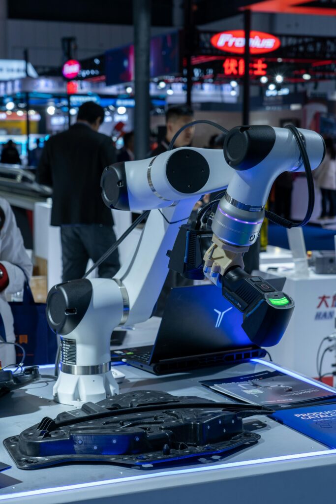 Close-up of advanced robotic arms at a technology expo showcasing automation and innovation. Technology