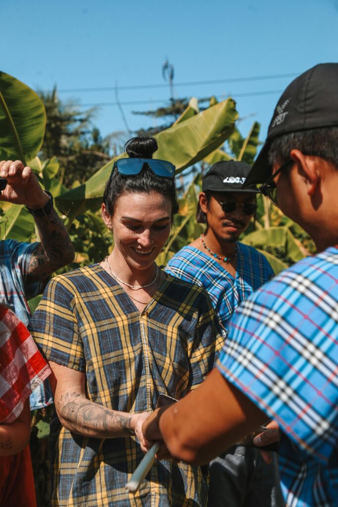 A diverse group of friends enjoying a sunny day outdoors in Chiang Mai, Thailand.